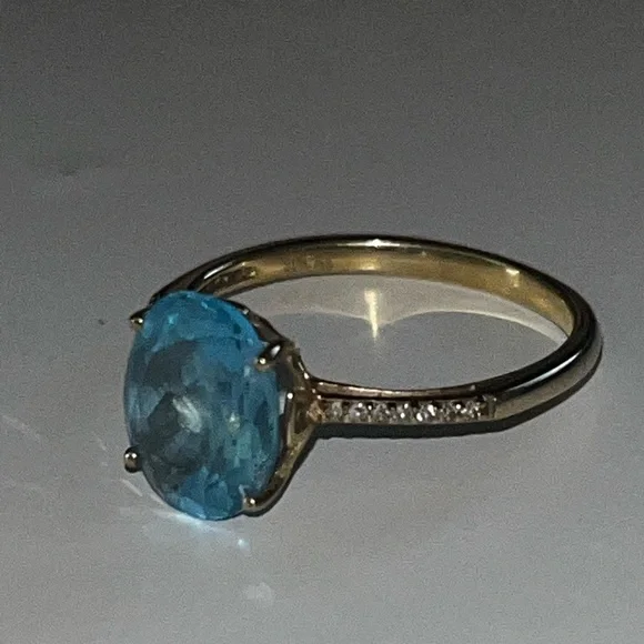 Blue Topaz yellow gold 10k ring with diamonds